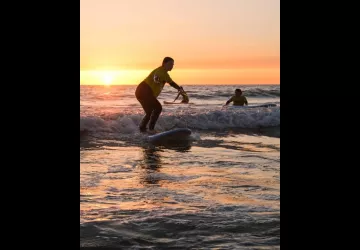 Surf coucher de soleil